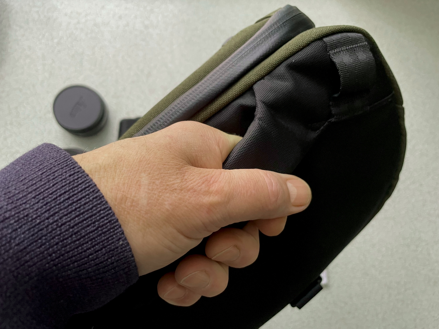 The Alpaka Vertex bag handle.