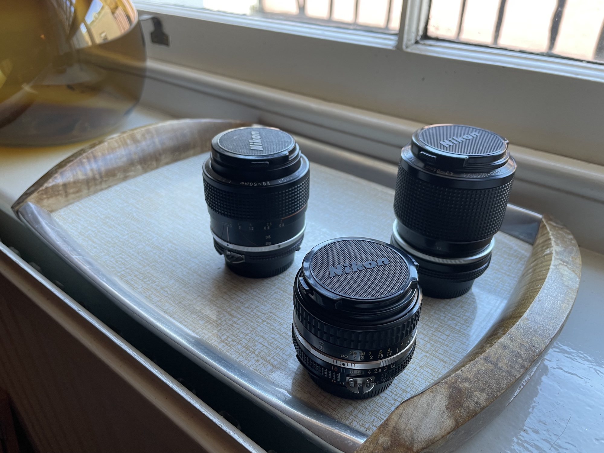 The Alpaka Vertex bag with a couple of lenses inside.